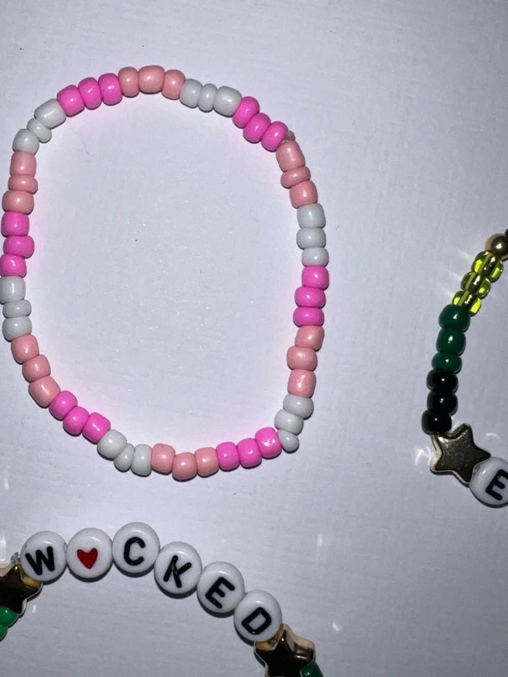 4 Wicked beaded bracelets.